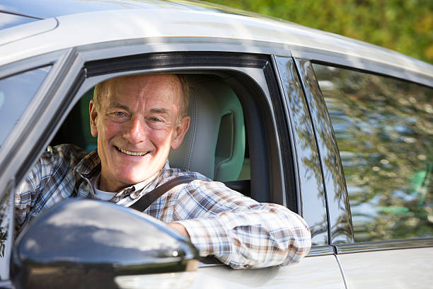 Portrait Of Smiling Senior Man Driving Car and commonly made mistakes